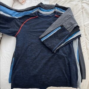 Multiple Lululemon Metal Vent Tech long sleeve shirts.